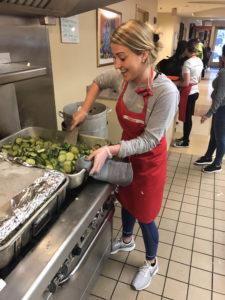 Curate Partners team member serving at Rosie's Place