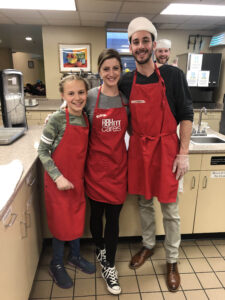 Curate Partners team members serving at Rosie's Place