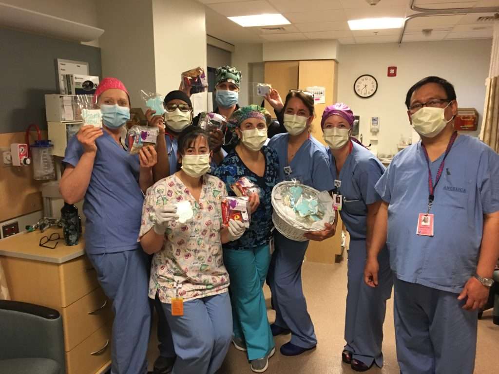 Curate Partners | Curate Cares Group of nurses with thank you basket